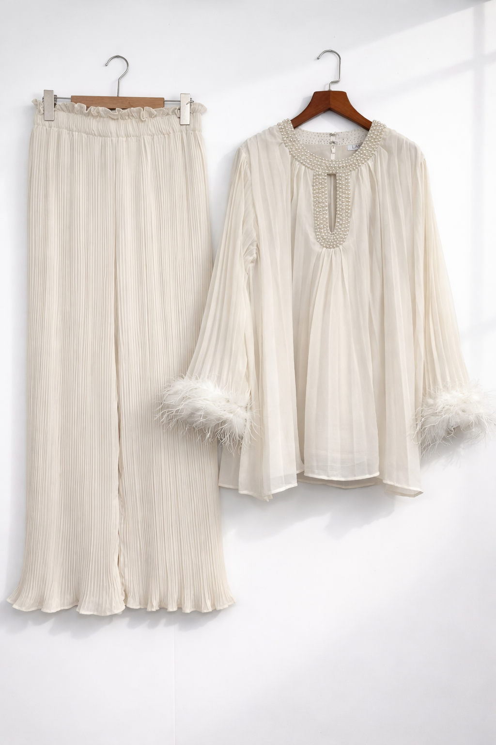 Pleated PEARL neck feather cuffed sleeve co ord set