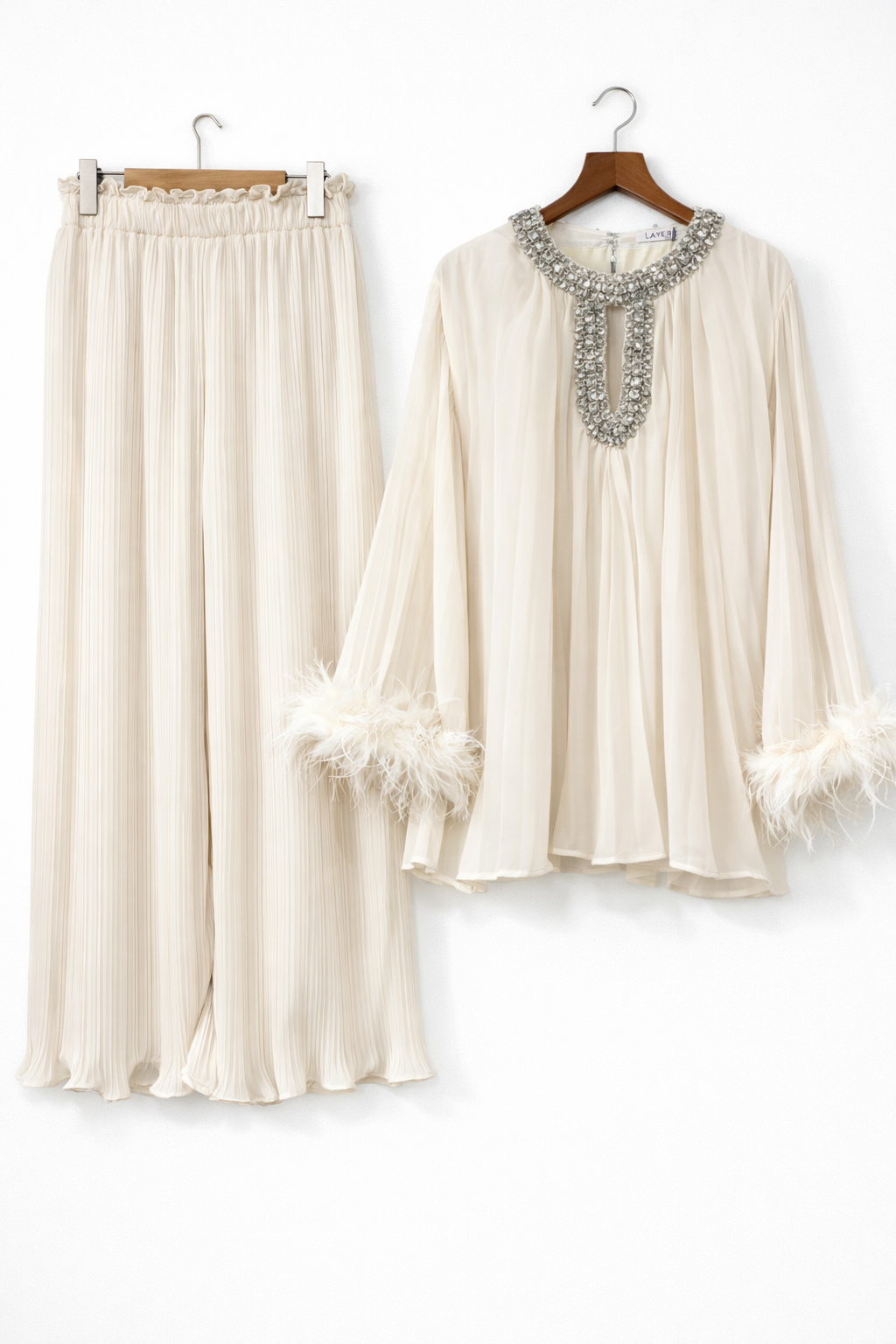 Pleated embellished neck feather cuffed sleeve co ord set