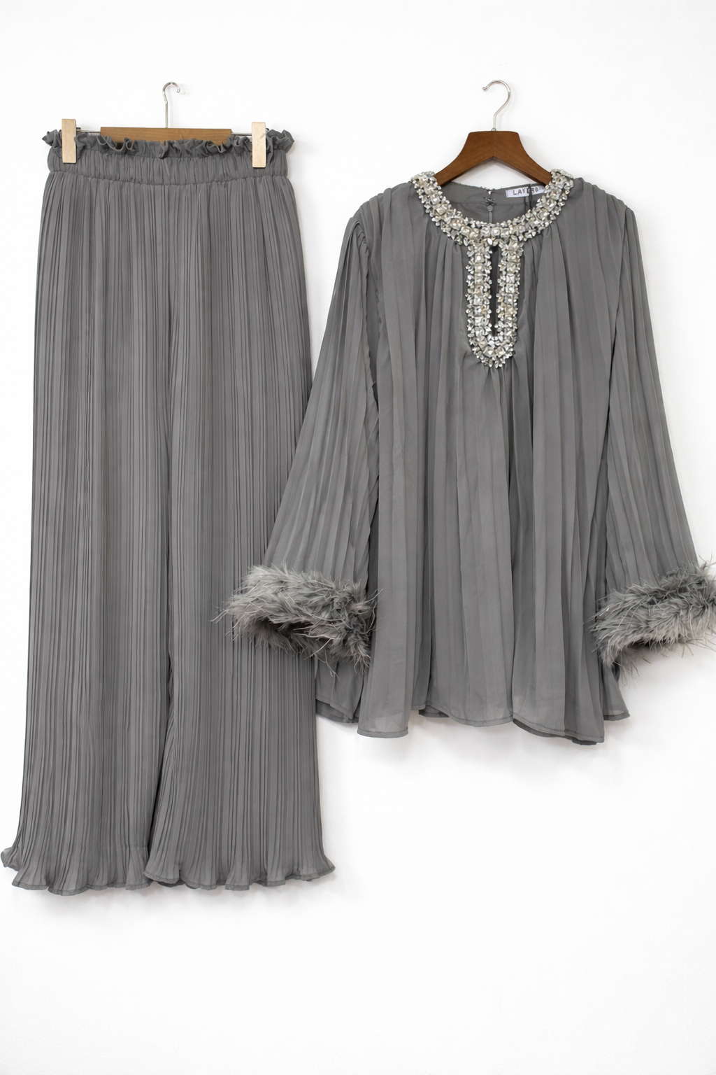 Pleated embellished neck feather cuffed sleeve co ord set